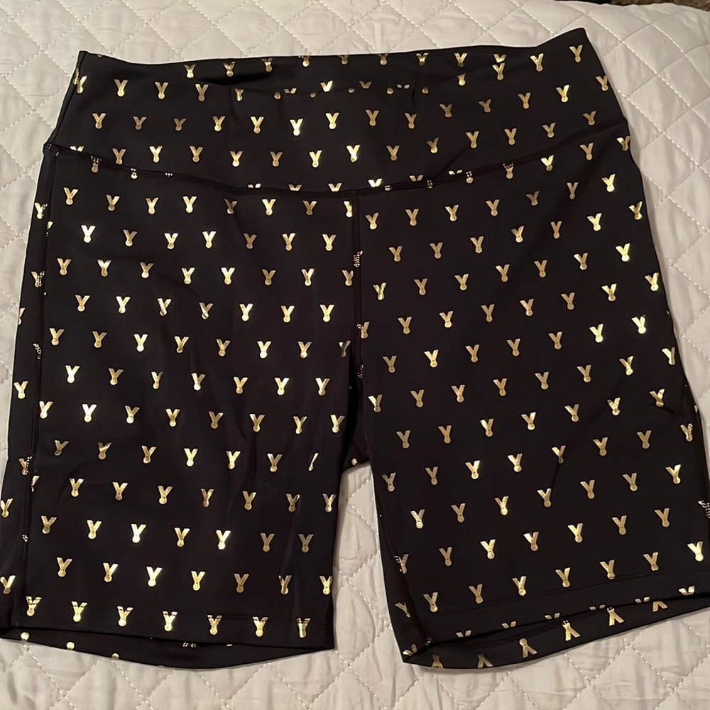 Black and gold medal Oiselle spandex shorts
